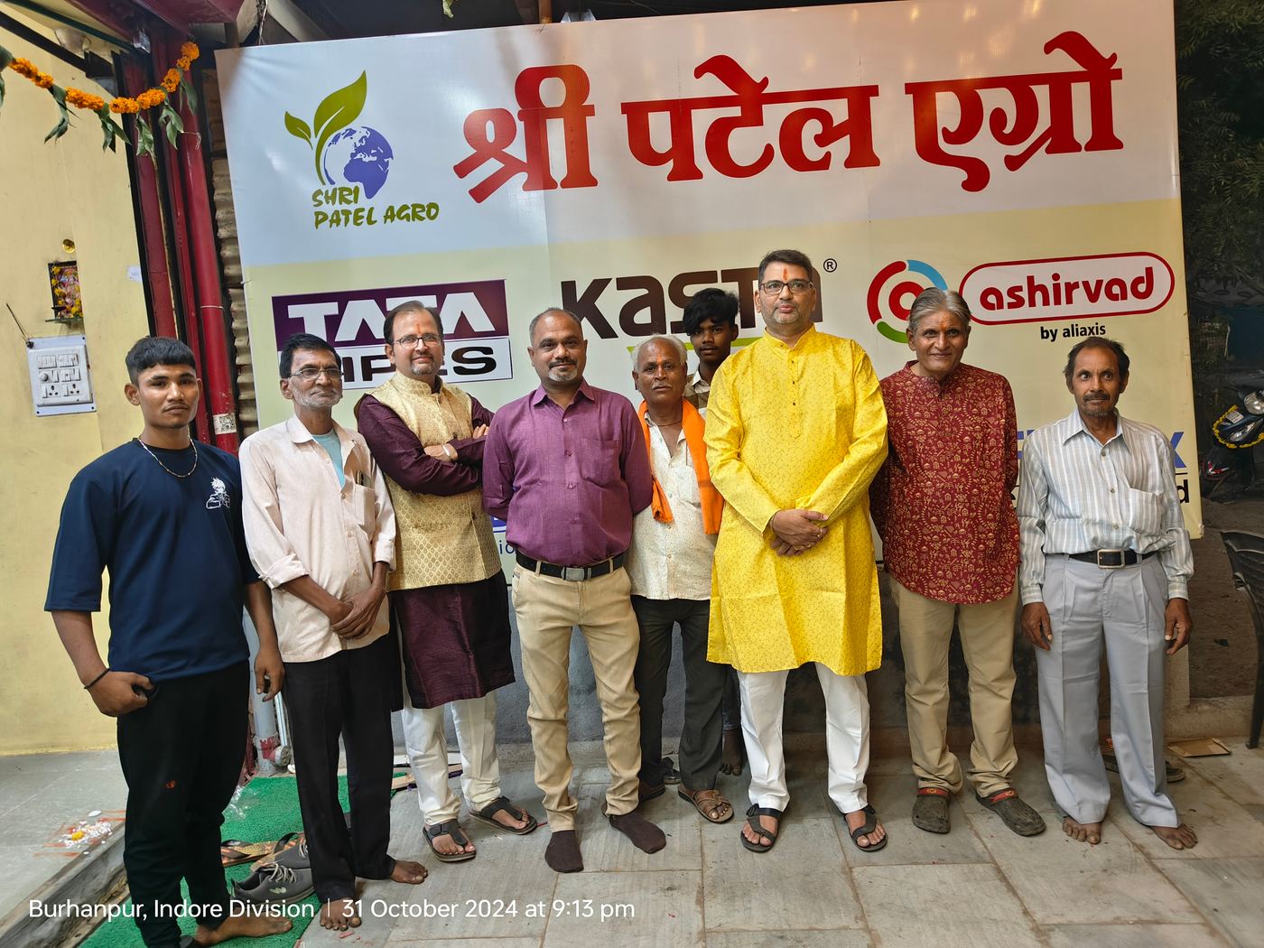 The Shri Patel Agro team in front of the shop
